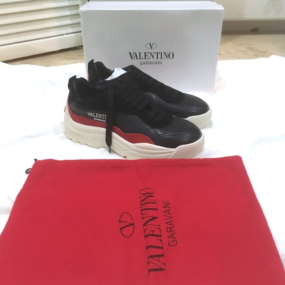 Black, white and red sneakers